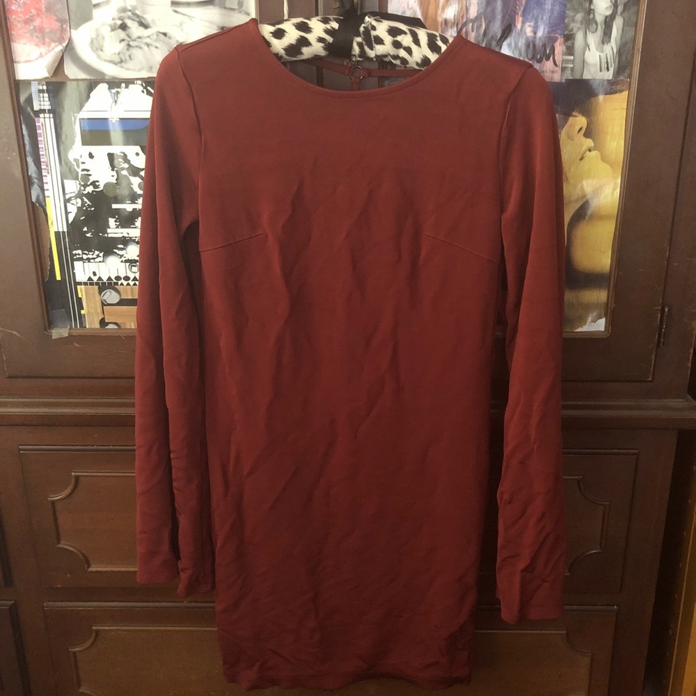 Burnt orange bell sleeve mini dress with open back